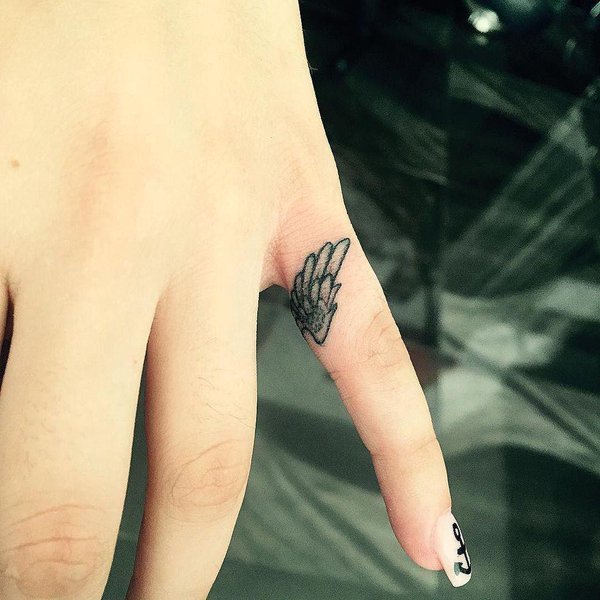 Angel wings Finger tattoos