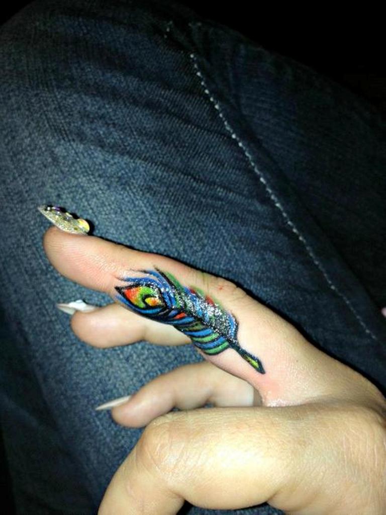 Peacock Feather Ring Finger Tattoo