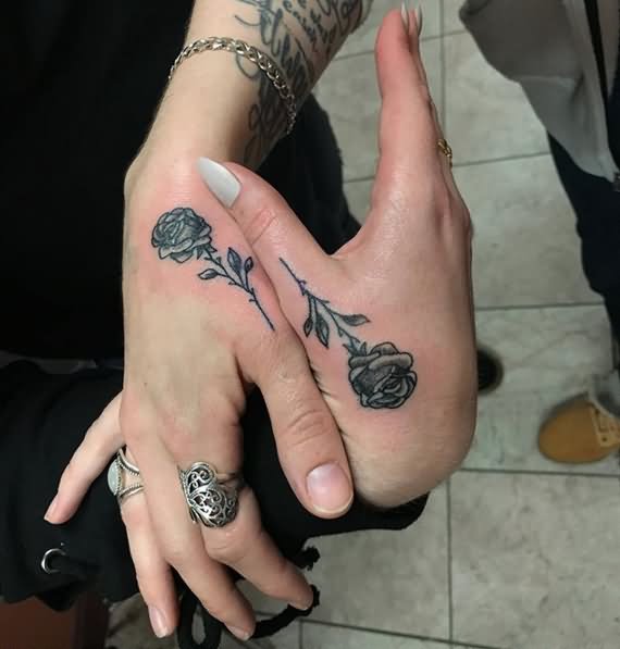 rose couple tattoo design on thumb