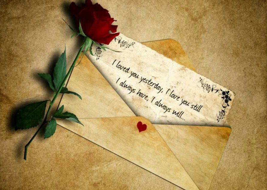 lovely rose flower with a letter.