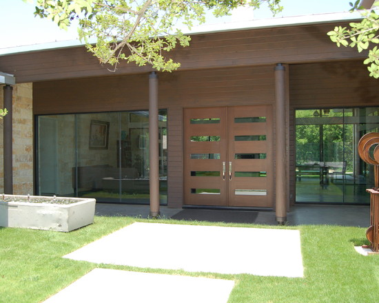 Put a stylish door at the wooden door / entry to become the identity of your home